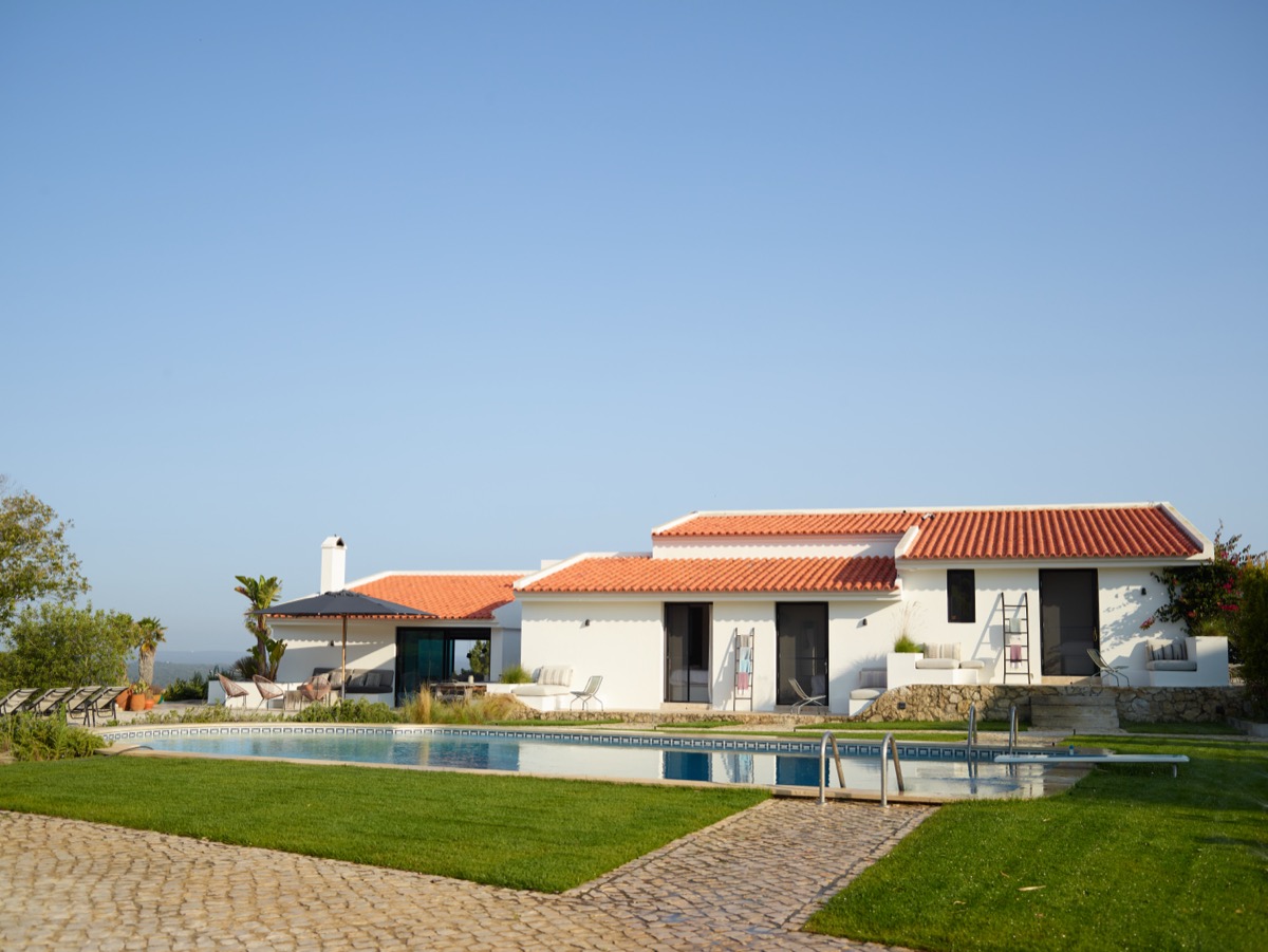 Sunlit lounge opening to the terrace and pool
